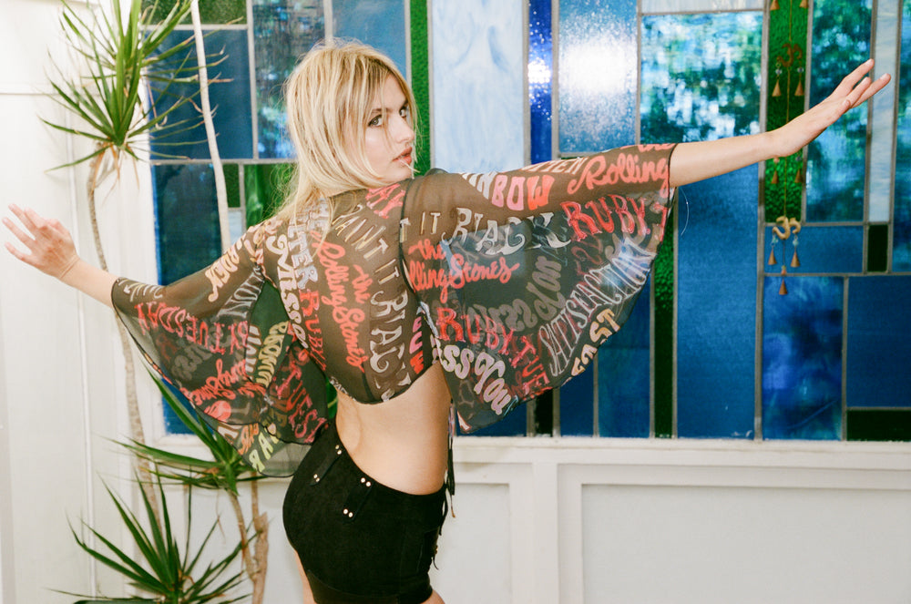 
                  
                    Rolling Stones x Stoned Silk top in cream
                  
                