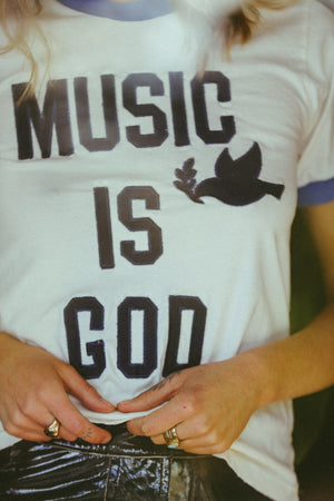 
                  
                    Music Is God Ringer
                  
                