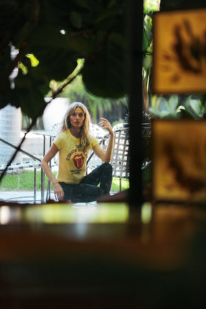 
                  
                    rolling stones 1975 baby tee pastel yellow
                  
                
