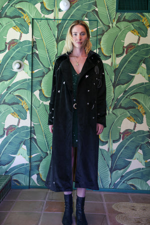 
                  
                    cosmic velvet trenchcoat in black
                  
                