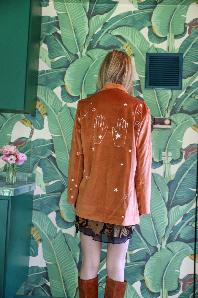 
                  
                    cosmic velvet jacket in rust
                  
                