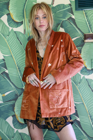 
                  
                    cosmic velvet jacket in rust
                  
                