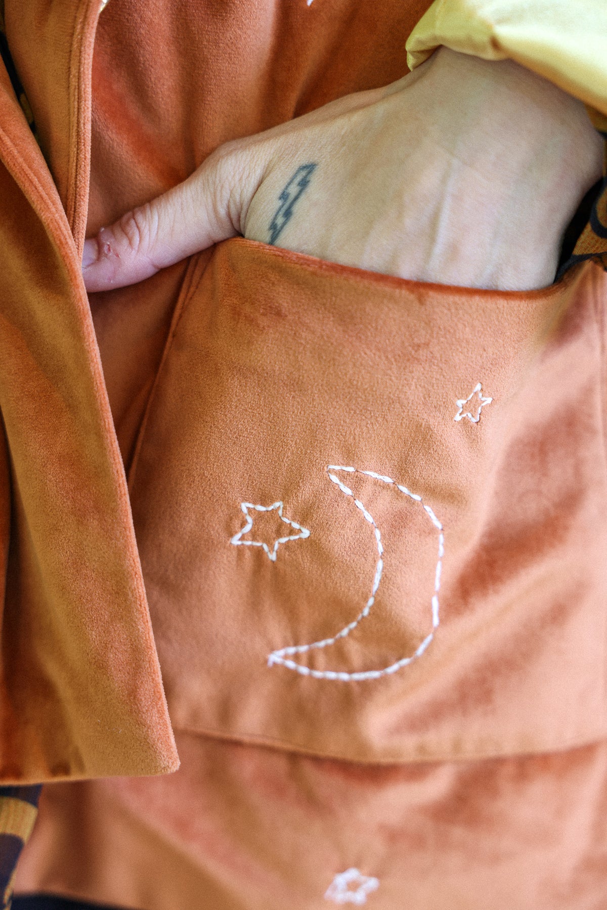 cosmic velvet jacket in rust