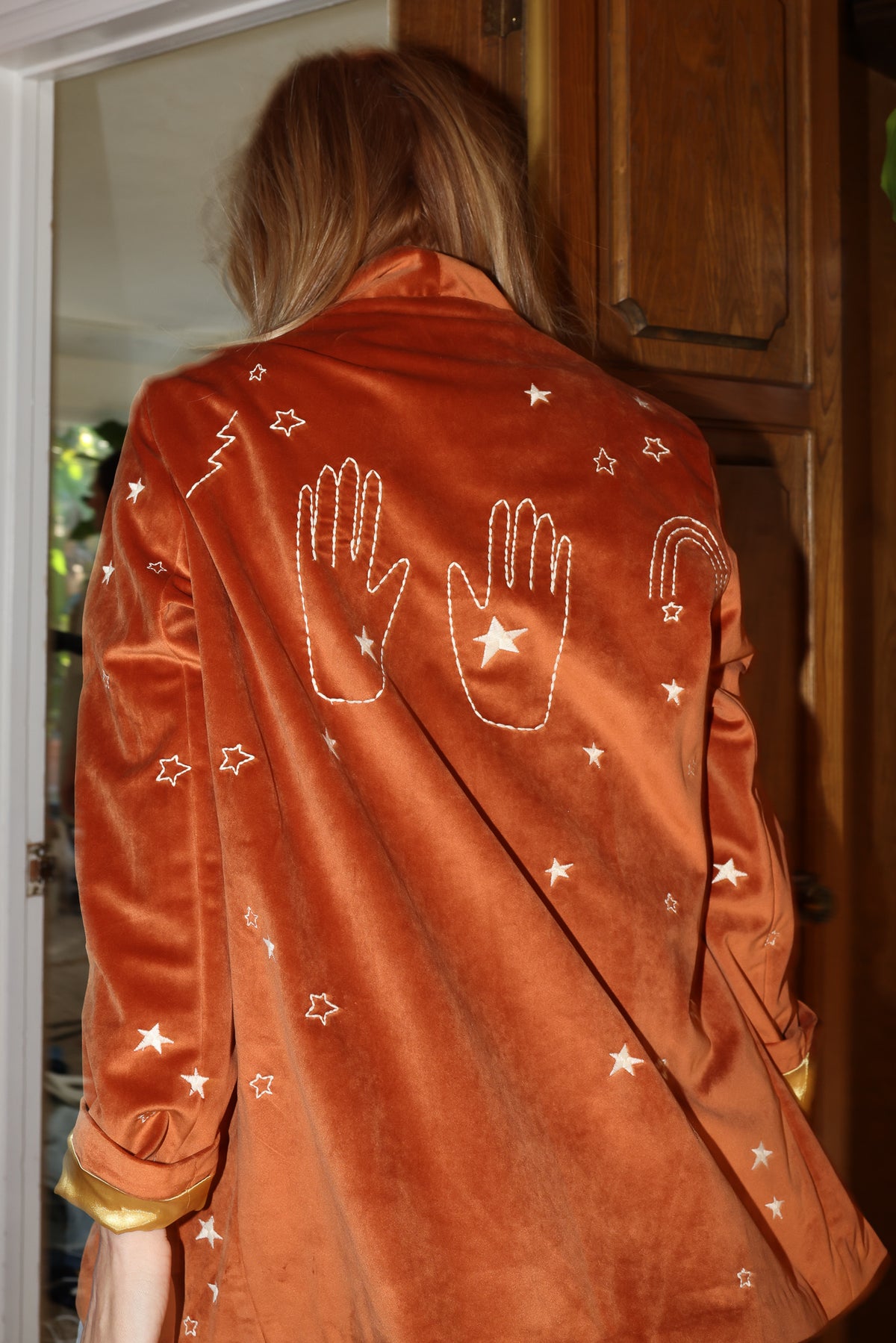cosmic velvet jacket in rust