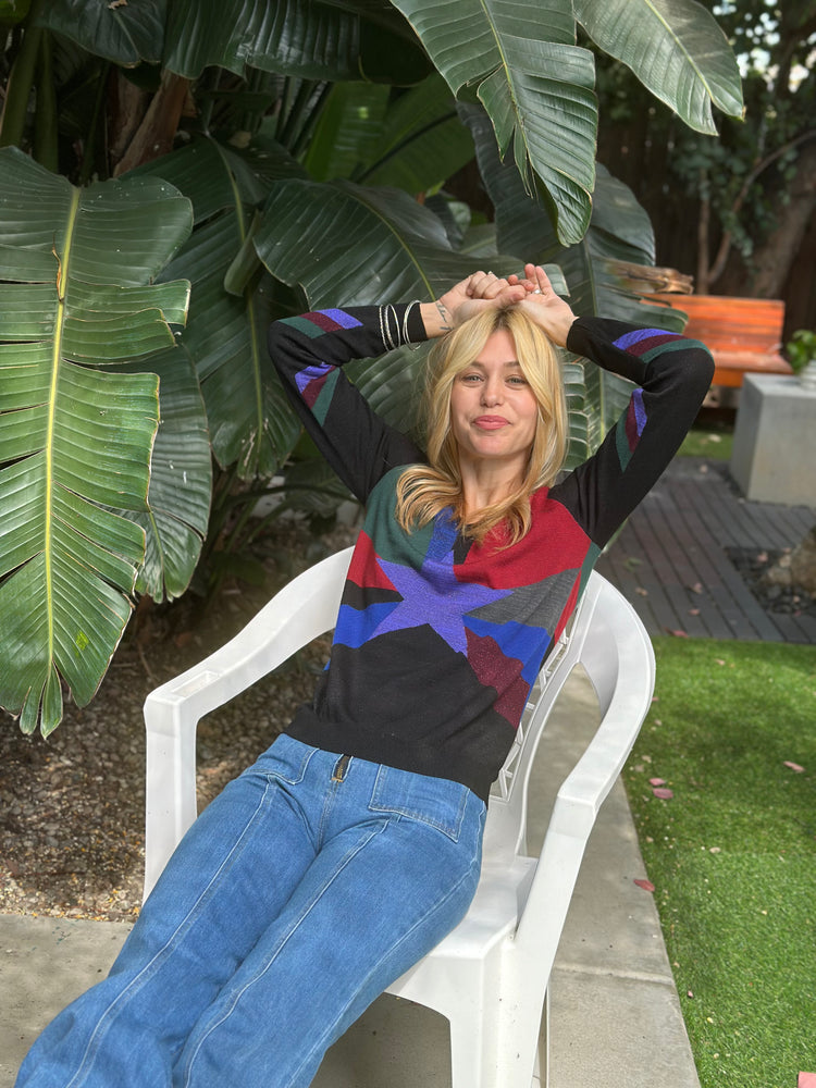 
                  
                    Stardust Vneck sweater 1
                  
                