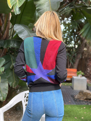 
                  
                    Stardust Vneck sweater 1
                  
                