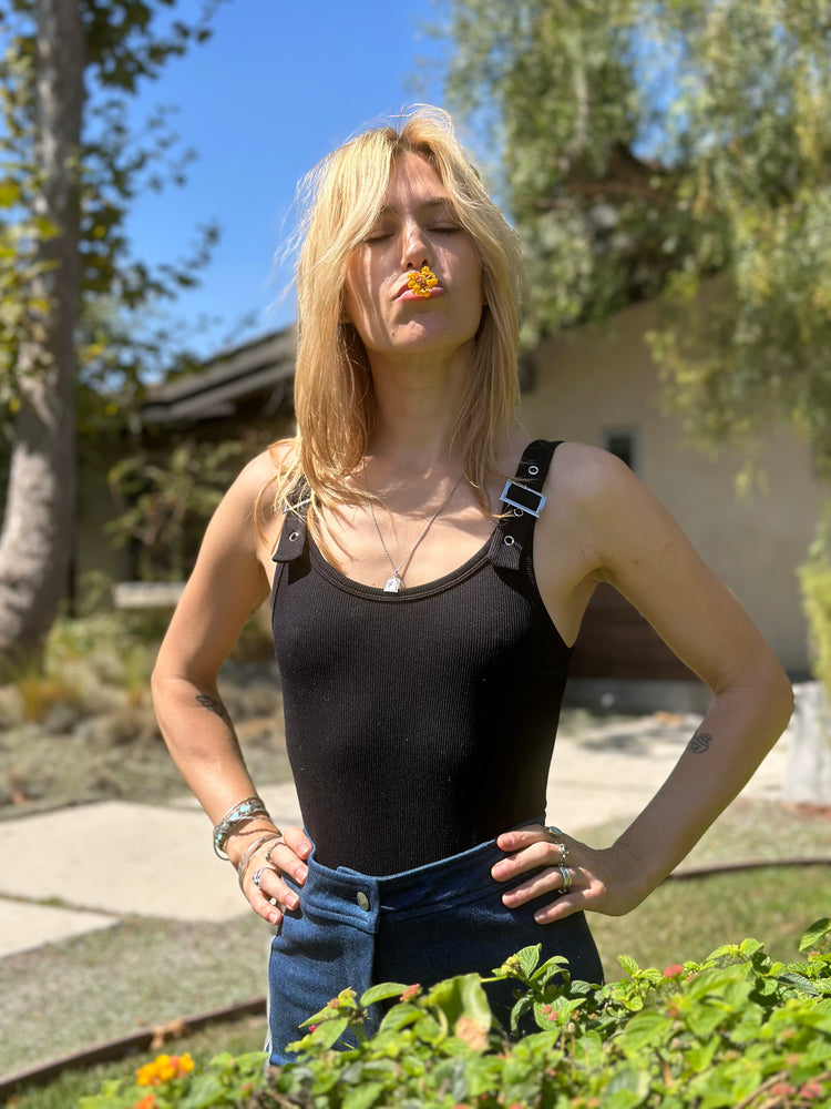 
                  
                    Runaways bodysuit in black
                  
                
