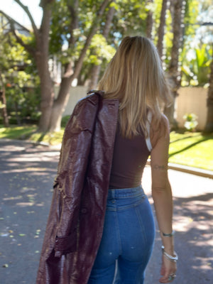 
                  
                    Nouvelle Vague trench in wine
                  
                