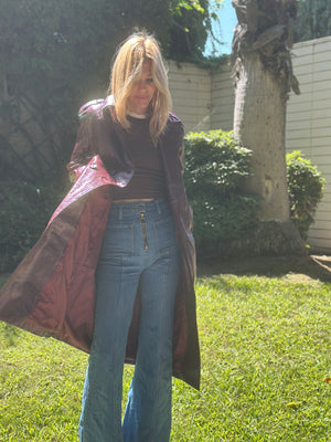 
                  
                    Nouvelle Vague trench in wine
                  
                