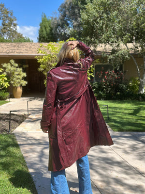 
                  
                    Nouvelle Vague trench in wine
                  
                