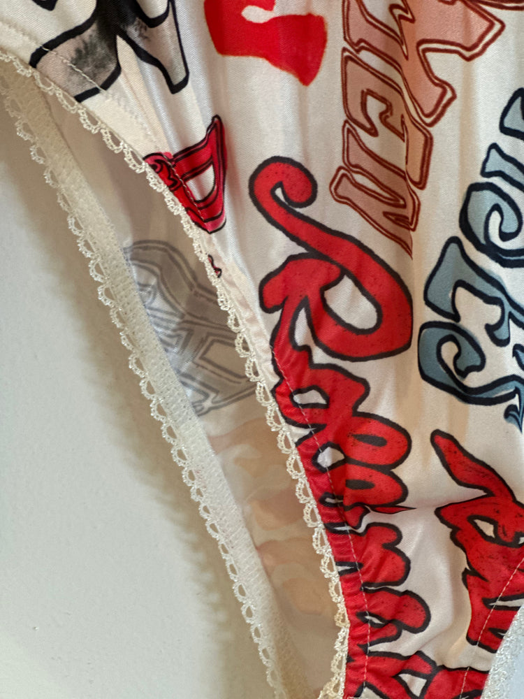 
                  
                    Rolling Stones x Stoned Song Titles Bodysuit
                  
                