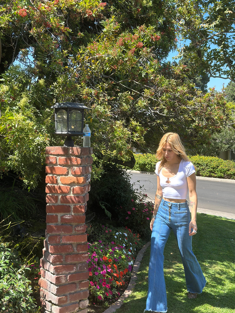 
                  
                    Rebel Yell top in white
                  
                