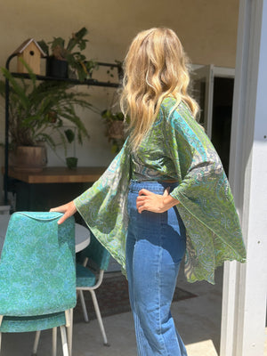 
                  
                    Blowin' in the Wind top
                  
                
