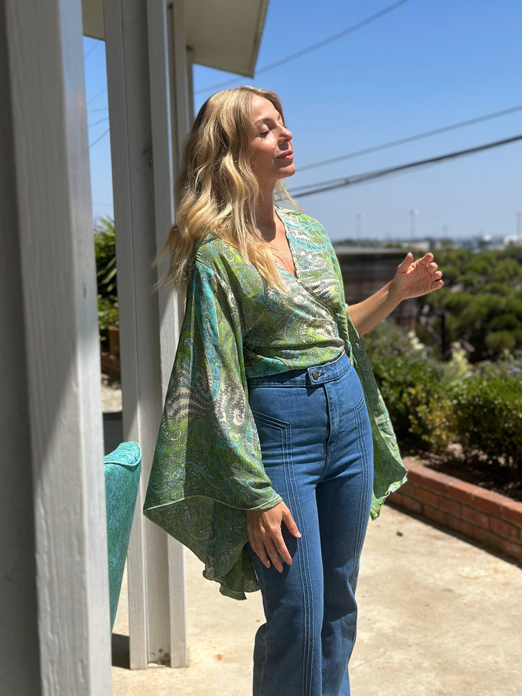 
                  
                    Blowin' in the Wind top
                  
                