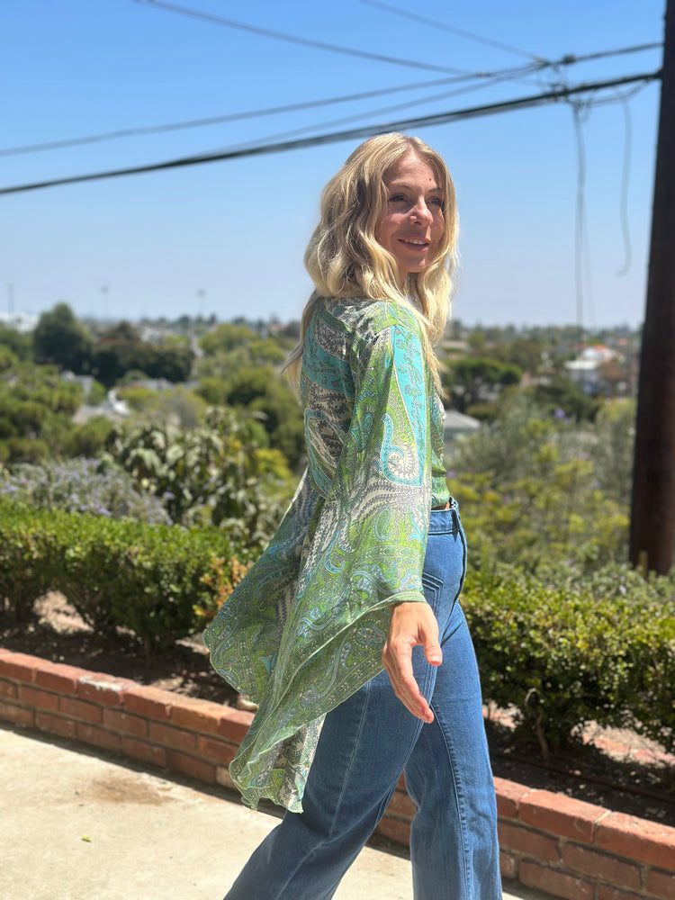 
                  
                    Blowin' in the Wind top
                  
                