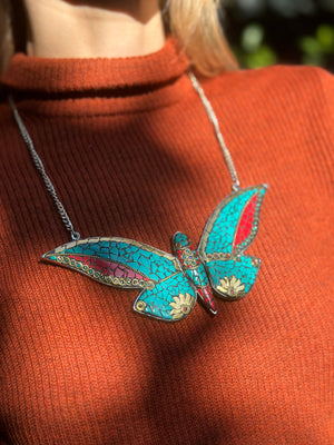 
                  
                    Wings necklace teal
                  
                