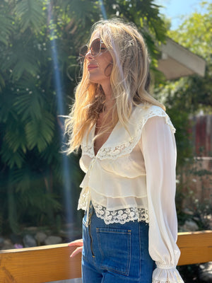 
                  
                    White Rabbit blouse
                  
                