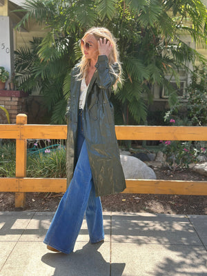 
                  
                    Nouvelle Vague trench in olive
                  
                