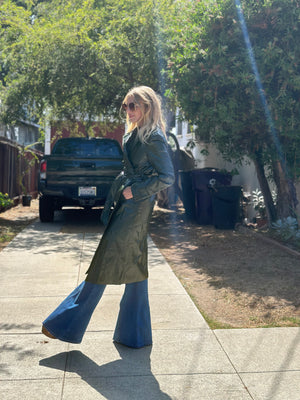 
                  
                    Nouvelle Vague trench in olive
                  
                