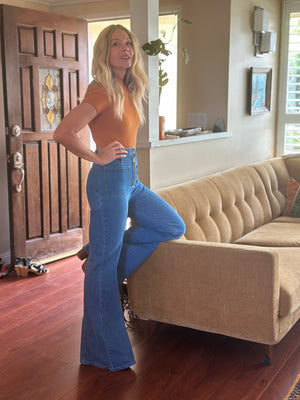 
                  
                    Dream On Bodysuit in mustard
                  
                