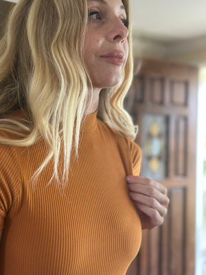 
                  
                    Dream On Bodysuit in mustard
                  
                