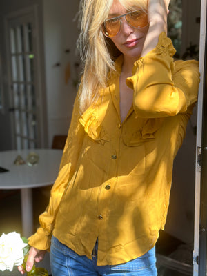 
                  
                    Françoise blouse in marigold
                  
                