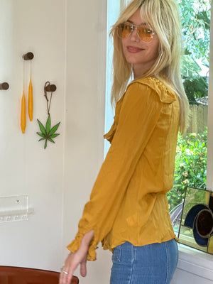 
                  
                    Françoise blouse in marigold
                  
                