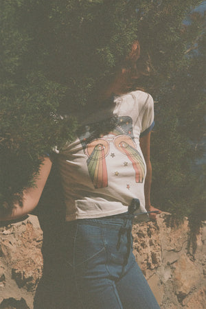 
                  
                    the girl with the kaleidoscope eyes ringer tee
                  
                