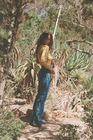 
                  
                    Françoise turtleneck in mustard
                  
                