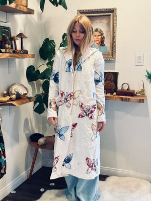 
                  
                    butterflies are free quilted coat
                  
                