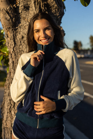 
                  
                    the farrah track jacket in navy
                  
                