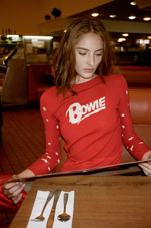 
                  
                    david-bowie-let's-dance-red-sweater-1
                  
                